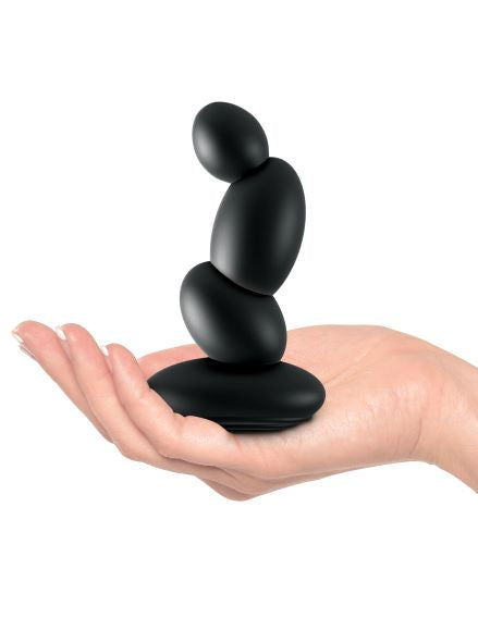 Sir Richard's Control Dual Motor P Spot Massager held in hand, showcasing its sleek black design for prostate stimulation.