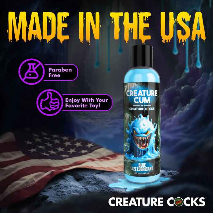 Creature Cum Blue Jizz Water-Based Lubricant 8 Oz bottle on a background with American flag, paraben free.