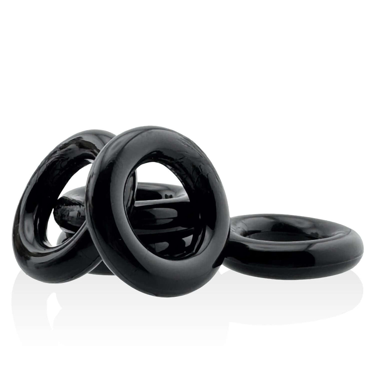 Oxballs Jacker 5-Stack Five-Pack Tube Super-Strong Cockrings Black displayed together in a sleek arrangement.