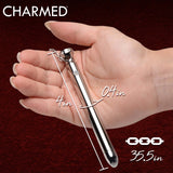 Charmed 7X Vibrating Necklace Silver held in hand, showcasing its sleek design and measurements.