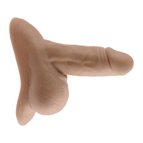 Gender X Stand To Pee Medium STP Packer Tan shown from the side, highlighting its realistic design and color.