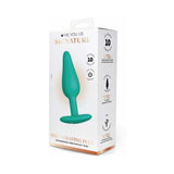 Me You Us Signature The Vibrating Plug Teal packaging showcasing adjustable vibration functions and sleek design.