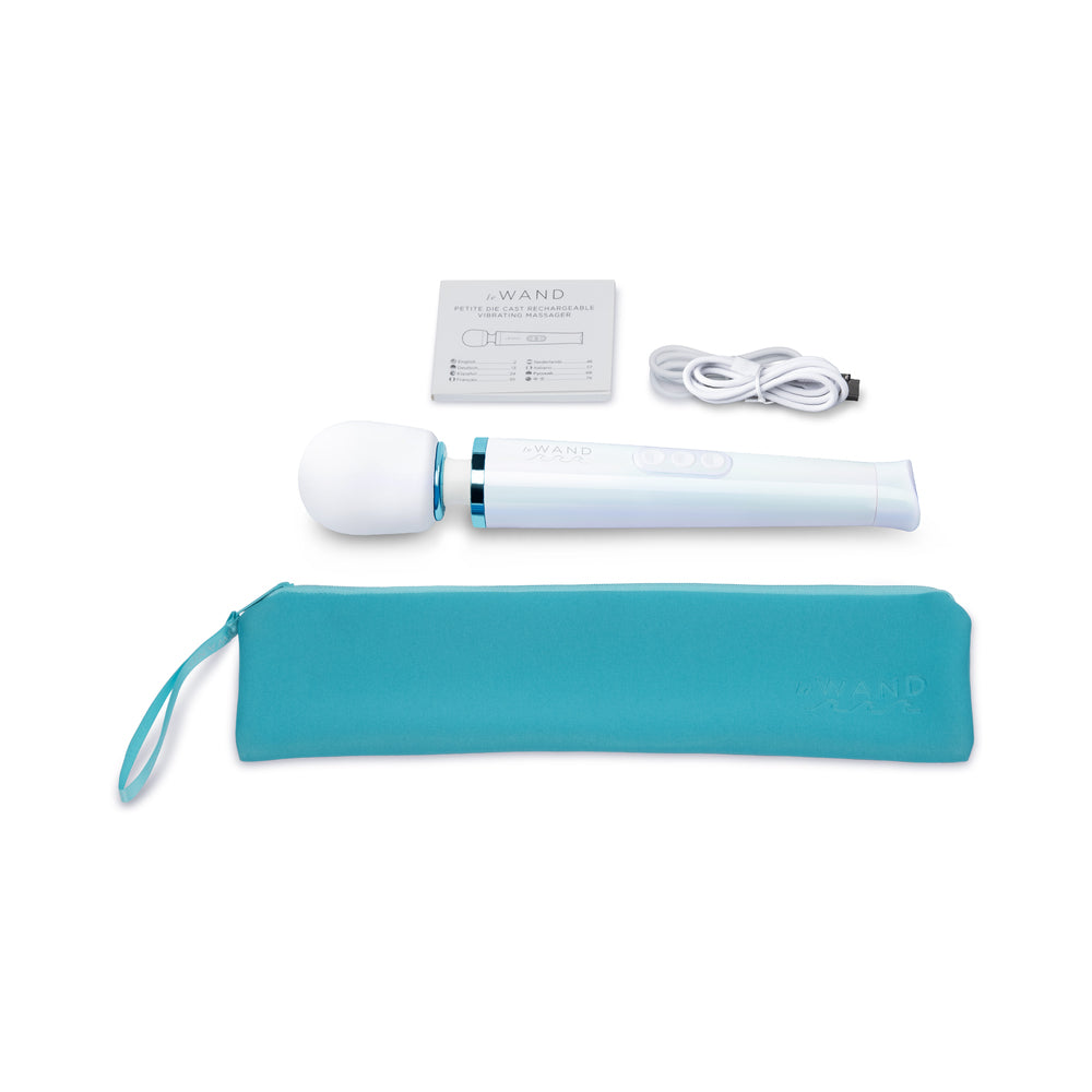 Le Wand Dive Submersible Vibrating Massager Seashell with accessories and packaging.