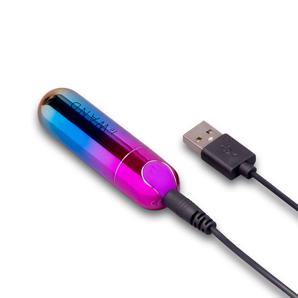 Le Wand Essentials Rechargeable Rainbow Bullet Vibrator with USB charging cable, colorful design for pleasure.