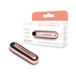Le Wand Essentials Mini Rose Gold Bullet Vibrator with sleek design and packaging, perfect for on-the-go pleasure.