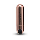 Le Wand Essentials Mini Rose Gold Bullet Vibrator in sleek rose gold design, perfect for targeted clitoral stimulation.
