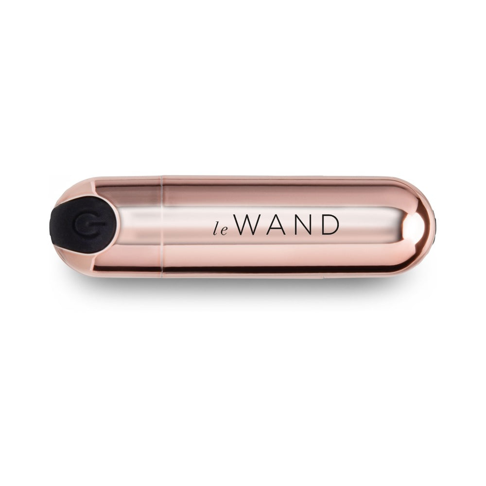 Le Wand Essentials Mini Rose Gold Bullet Vibrator in a sleek design, perfect for targeted stimulation and discreet storage.
