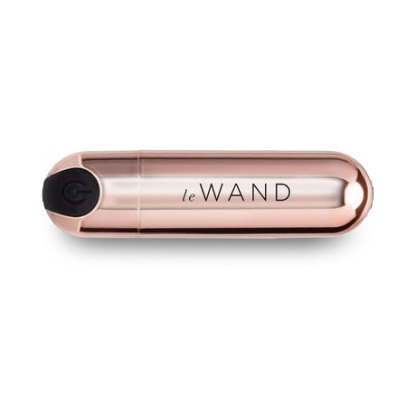 Le Wand Essentials Mini Rose Gold Bullet Vibrator in a sleek design, perfect for targeted stimulation and discreet storage.