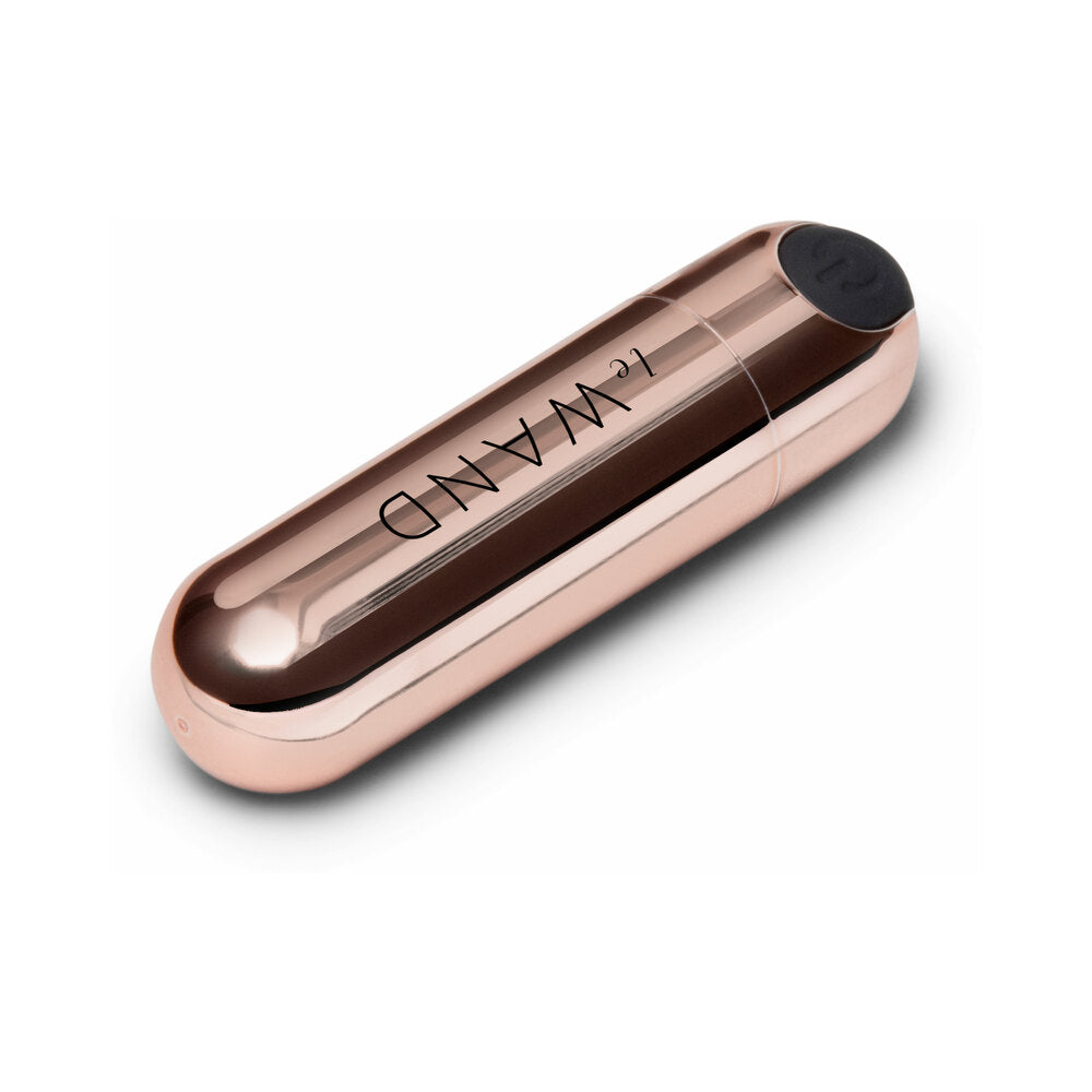 Le Wand Essentials Mini Rose Gold Bullet Vibrator in sleek rose gold design for targeted stimulation.