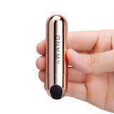 Le Wand Essentials Mini Rose Gold Bullet Vibrator held in hand, compact design for targeted stimulation.