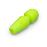 Le Wand Essentials Mini Wand Vibe Pocket-sized Vibrator in vibrant green color, designed for portable pleasure.