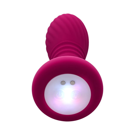 Evolved Party Plug Silicone Rechargeable Burgundy featuring thrusting motion and illuminated base.