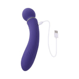 Evolved Shiver Silicone Rechargeable Vibrator Purple charging with USB cable.