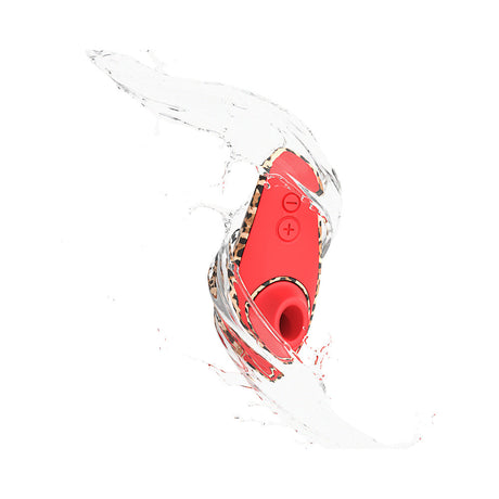 Womanizer Liberty 2 Leopard Air Pulse Clitoral Stimulator surrounded by water, showcasing its sleek design.