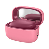Womanizer Snap Clitoral Stimulator Crushed Berry in a pink charging case with mirror.