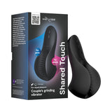 We-Vibe Shared Touch Rechargeable Vibrator Black in sleek packaging showcasing features for couple's pleasure.