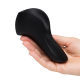 We-Vibe Shared Touch Rechargeable Vibrator Black held in hand, showcasing its ergonomic design and sleek finish.