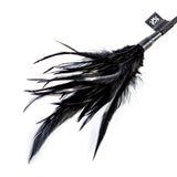 Sei Mio Double Standards Whip and Tickler with black feathers for versatile impact play.