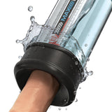 Pumpworx Maxboost Pro Flow Deluxe Penis Pump Kit Black in use with water splashing around the device.