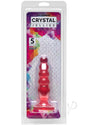 Crystal Jellies Anal Delight Anal Plug 5 inch Pink displayed in colorful packaging with clear front.