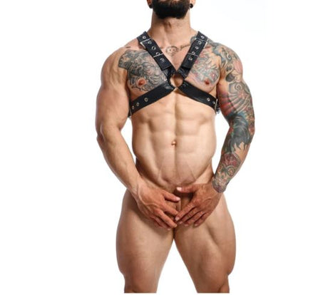 Male Basics Dngeon Classic Cross Harness Black Os worn by muscular man, showcasing tattoos and confident physique.