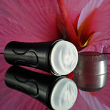 Zero Tolerance Hold Tight Vibrating Stroker Black with realistic vaginal entry and squeezable design.