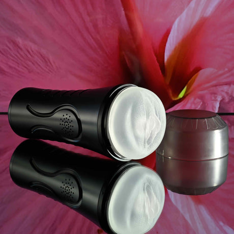 Zero Tolerance Hold Tight Vibrating Stroker Black with realistic vaginal entry and squeezable design.