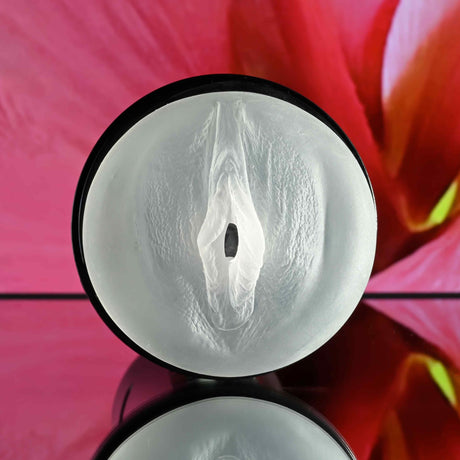 Zero Tolerance Hold Tight Vibrating Stroker Black realistic design with a squeezable canister for enhanced pleasure.