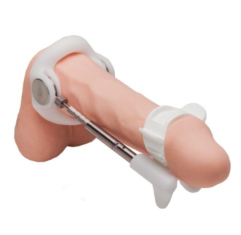 Jes-Extender Original Standard Penis Extender in use, showcasing its design and traction mechanism.