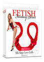 Fetish Fantasy Silk Rope Love Cuffs Red packaging featuring soft red ropes for comfortable bondage play.