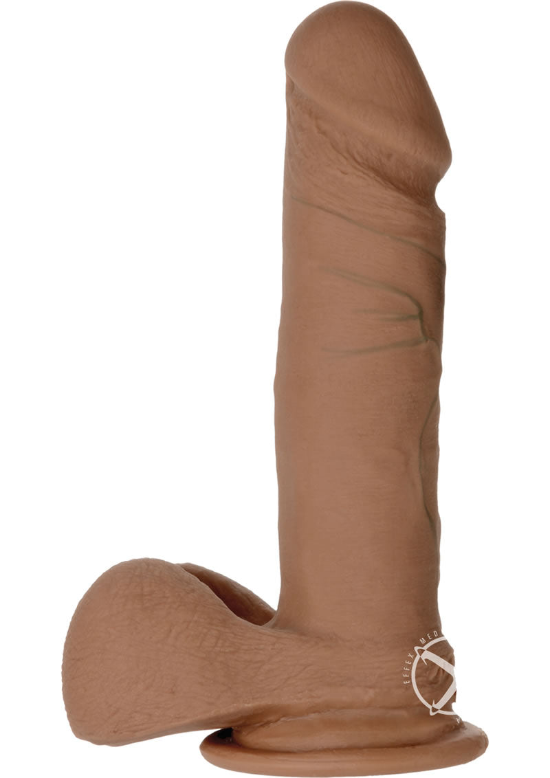 The Realistic Cock Ultraskyn Dildo 6 inch Caramel with detailed texture and suction cup base.