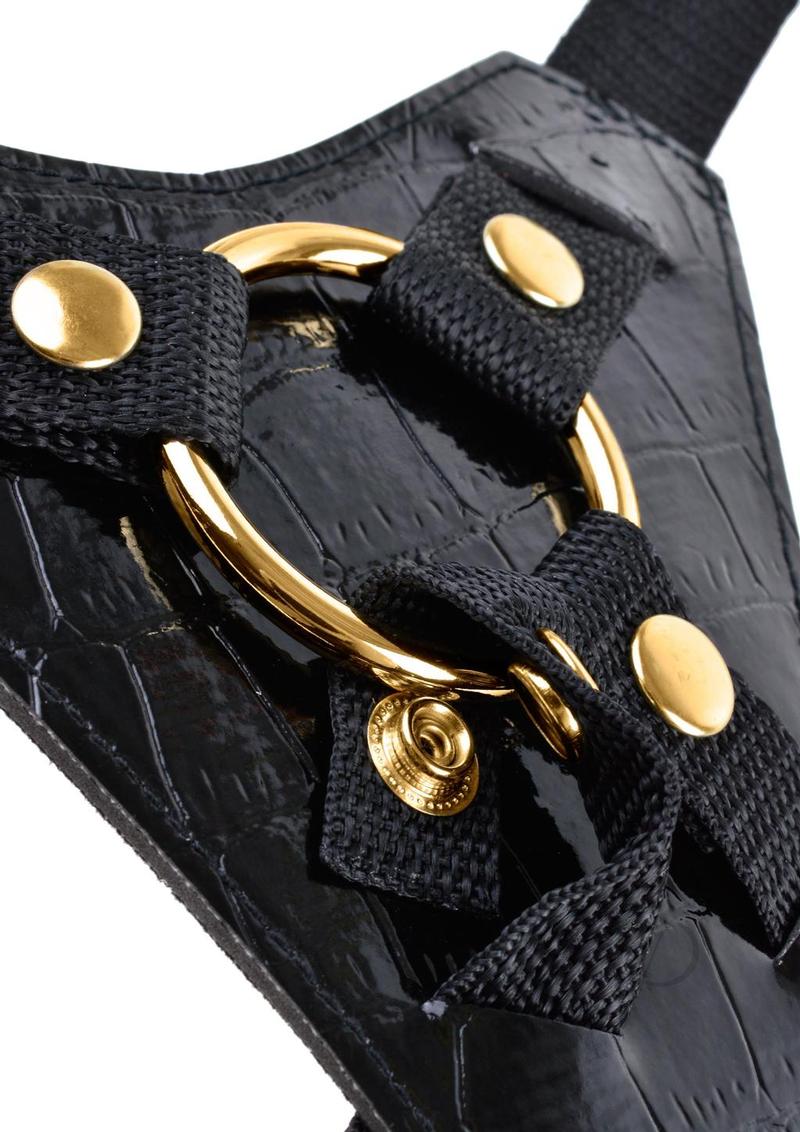 Fetish Fantasy Gold Designer Strap-On 7 inch Black Gold close-up of harness with metallic O-ring and black straps.