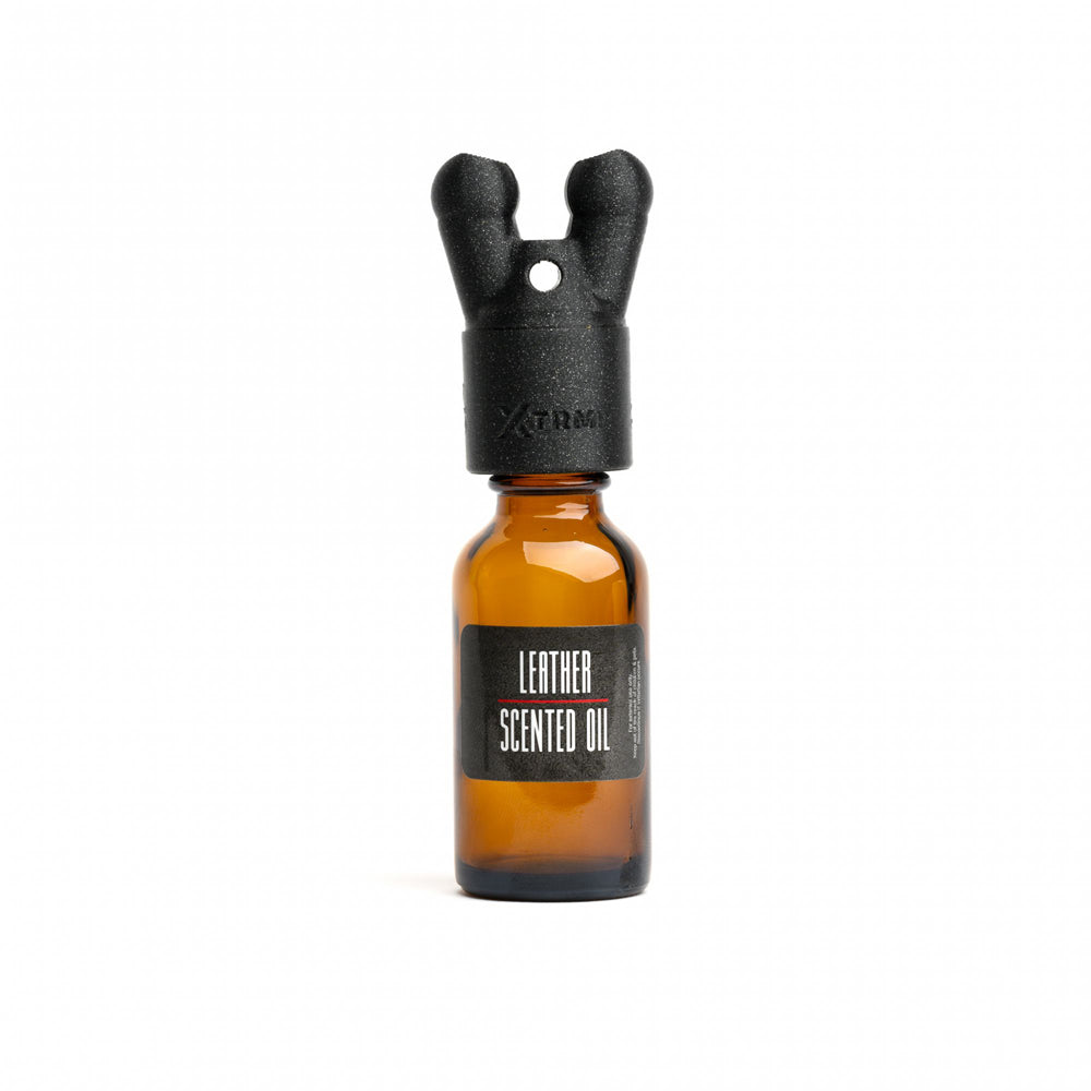 Xtrm Snffr 2.0 Leakproof Double Small Red with leather scented oil bottle and unique nose design.