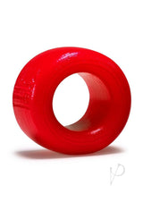 Oxballs Atomic Jock Balls-T Silicone Ball Stretcher Red viewed from the side, showcasing its vibrant red color and smooth design.