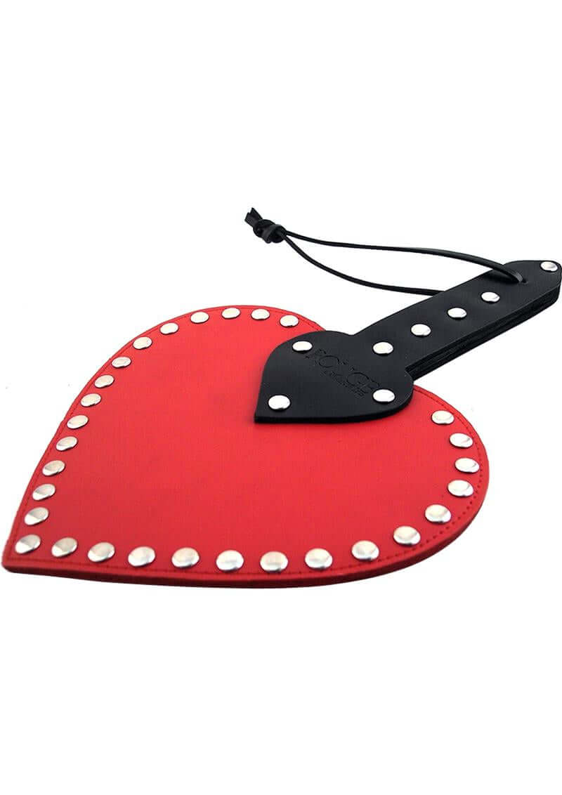 Rouge Heart Leather Paddle Red Black featuring studs, crafted from genuine leather, ideal for impact play.