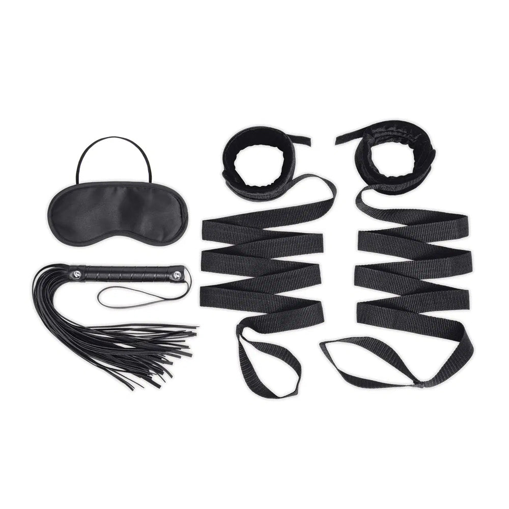 Lux Fetish 4 Piece Bondage Bed Strap Flogger Kit includes mask, flogger, and restraints for sensual play.