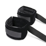 Lux Fetish 4 Piece Bondage Bed Strap Flogger Kit soft black wrist restraints with adjustable straps.