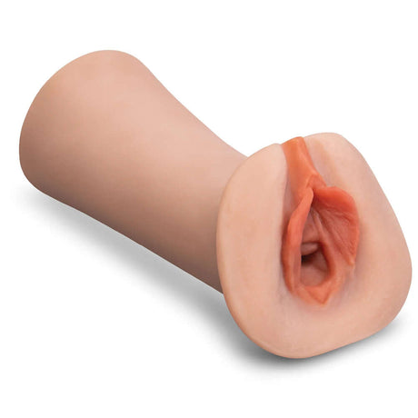 Stroke-x Juicy Pussy Self-Lubricating Stroker showcasing soft outer lips and realistic textured canal.