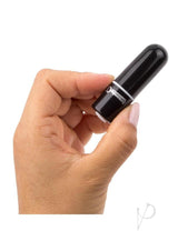 Person holding the Charged Vooom Rechargeable Bullet Vibrator Black in hand for targeted stimulation.