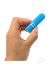 Charged Vooom Rechargeable Bullet Vibrator Blue held in hand ready for use.