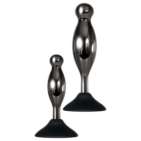 Evolved Joy Sticks 2 Piece Anal Plug Set Black Chrome featuring two sculpted plugs with smooth silicone bases.