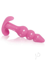 Evolved Intense Pleasure Kit Pink Couples Toy Set featuring a sleek pink anal plug for intimate exploration.