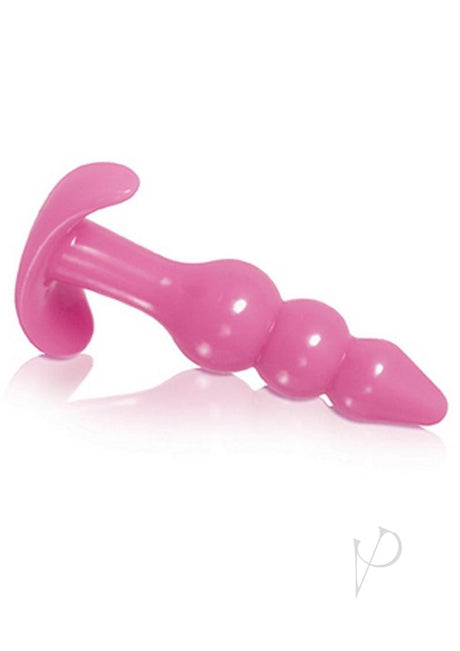 Evolved Intense Pleasure Kit Pink Couples Toy Set featuring a sleek pink anal plug for intimate exploration.