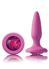 Glams Mini Silicone Butt Plug Pink Gem with a sparkling pink gem base for stylish intimate play.