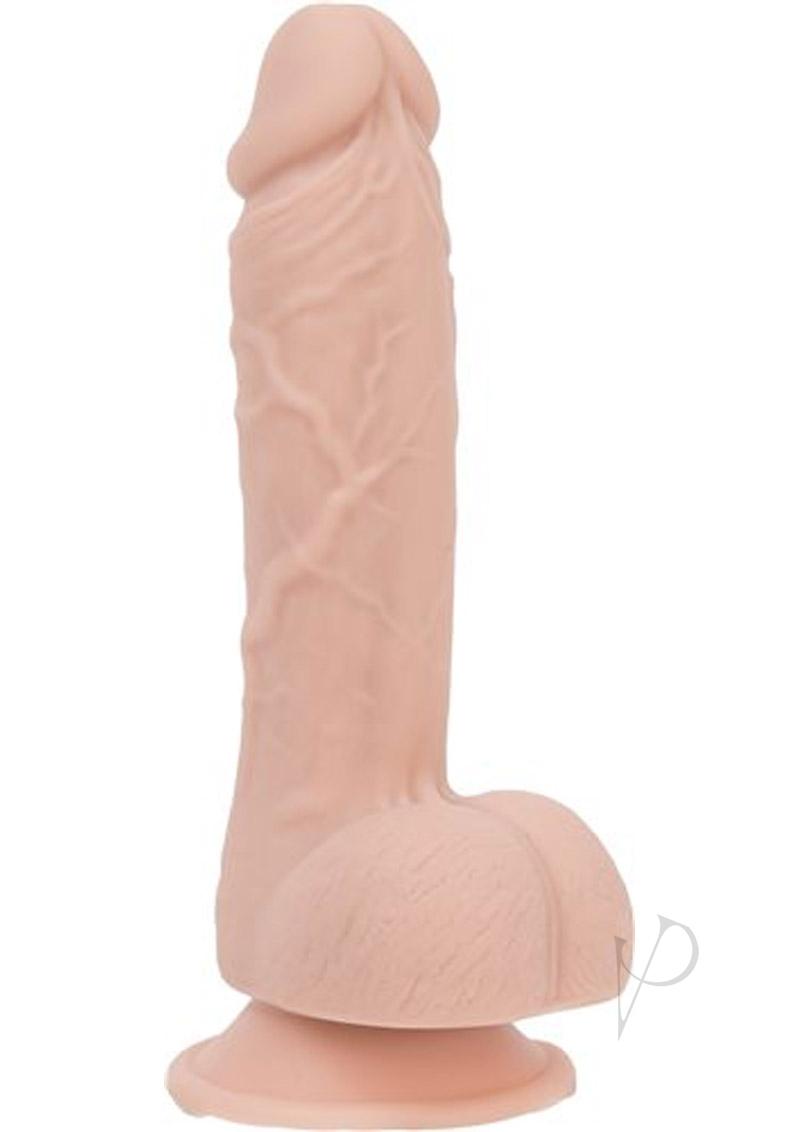 Addiction Mark 7.5 Inch Silicone Dildo with Balls Vanilla displayed upright, showcasing realistic details and suction base.