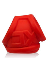Oxballs Oxsling Silicone Blend Power Sling Red showcased from the side, highlighting its unique design and texture.