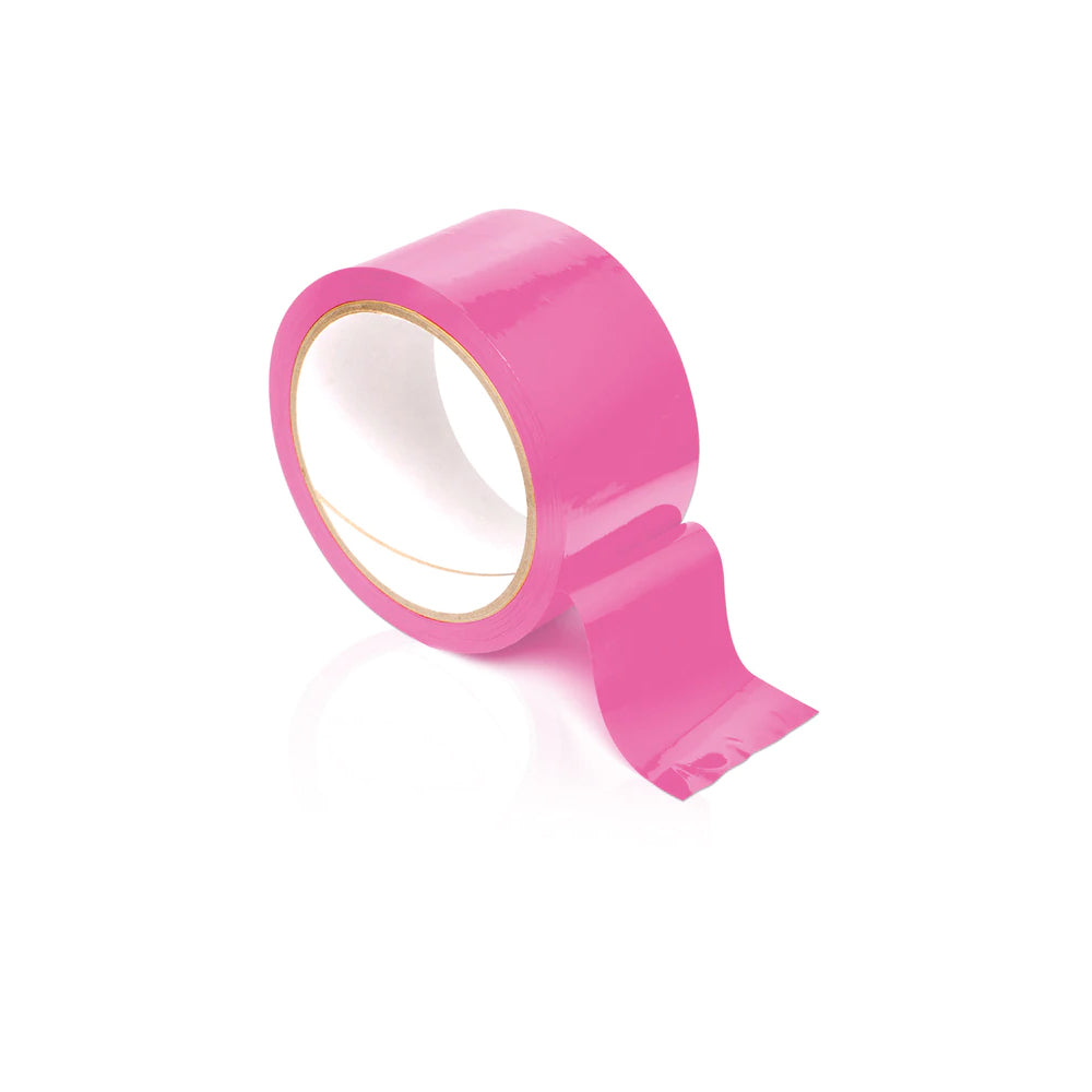 Fetish Fantasy Series Pleasure Tape Pink in a roll, showcasing shiny, non-sticky bondage tape for restraint play.