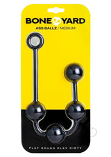 Boneyard Ass Ballz Silicone Anal Beads Medium Black packaging with black beads on yellow background.