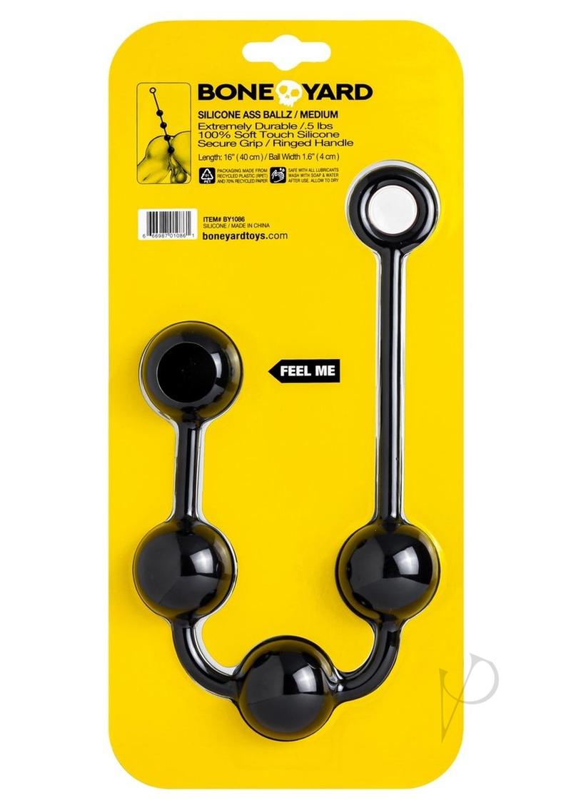 Boneyard Ass Ballz Silicone Anal Beads Medium Black in packaging with yellow background, featuring four black silicone balls.