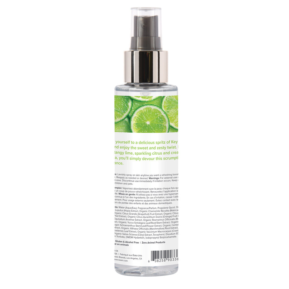 Coochy Fragrance Body Mist Key Lime Pie 4 Oz with refreshing lime and citrus scent in a clear spray bottle.